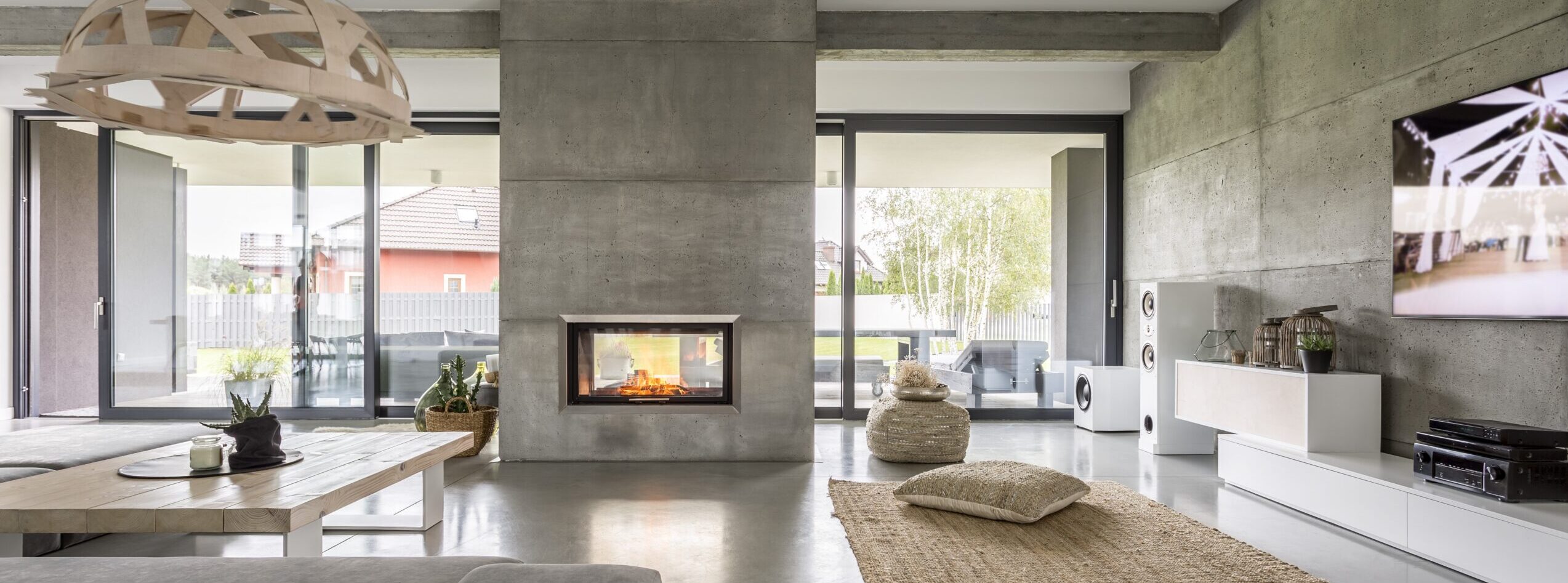 Spacious,Villa,Interior,With,Cement,Wall,Effect,,Fireplace,And,Tv